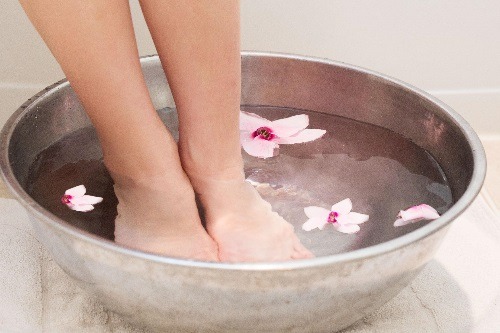 Soaking Feet in Water to soften caluses