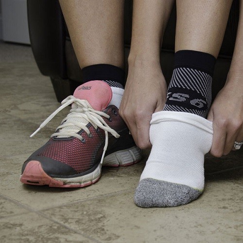 Wearing OrthoSleeve FS6 Compression Foot Sleeve Pair Under Socks
